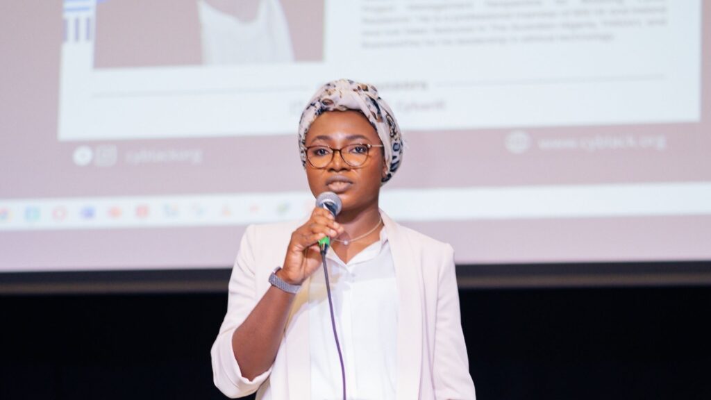 Simbiat Sadiq, CyBlack co-founder, speaking at a cybersecurity event.