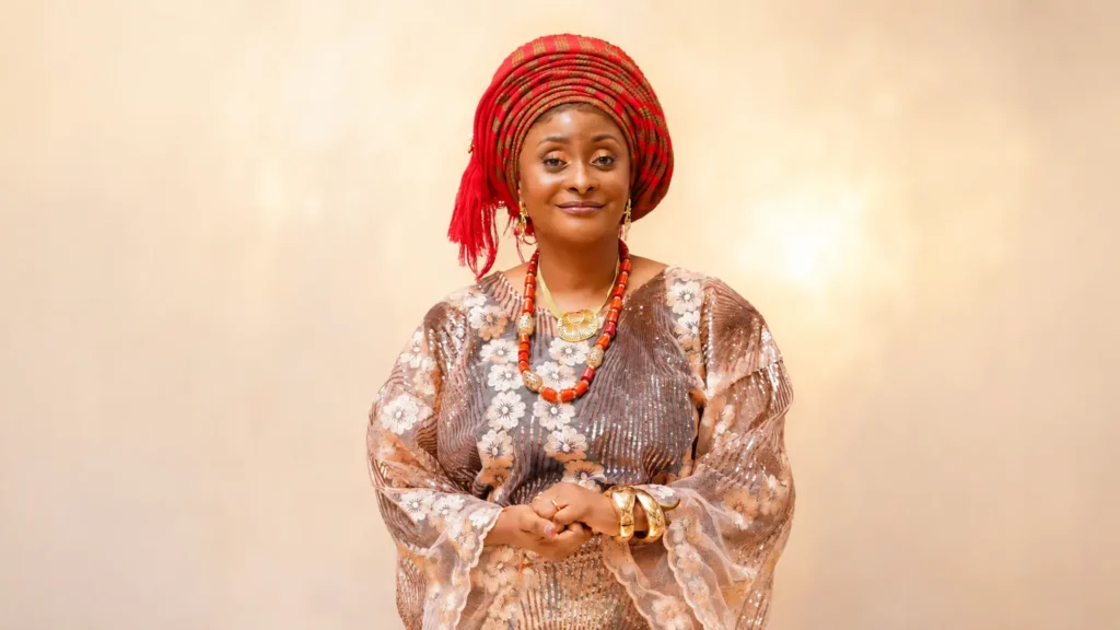 Princess Tolulope Oluwasola pictured in traditional attire during her golden jubilee celebration in Harrow.